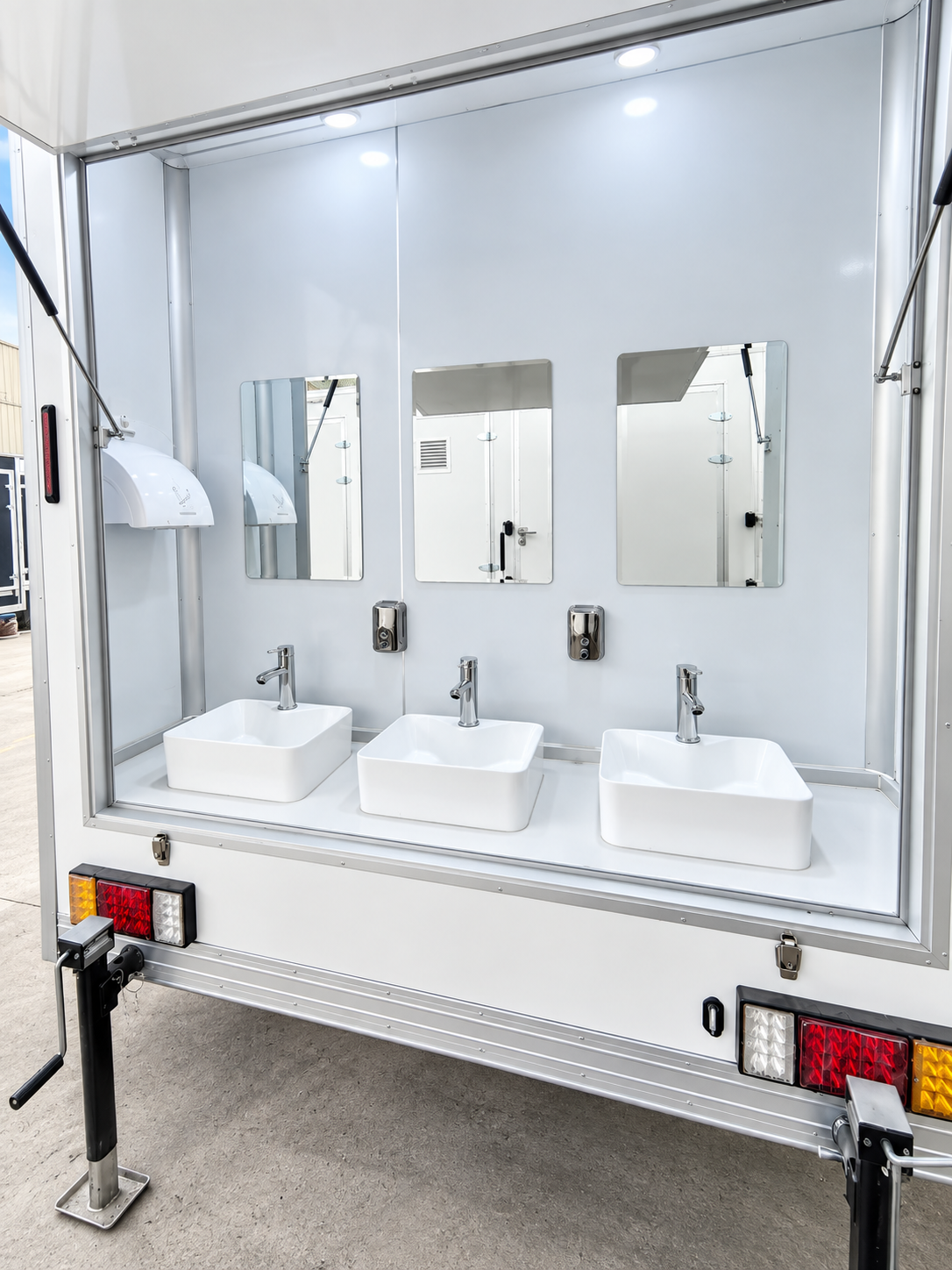 Sink and mirror area in a mobile shower trailer